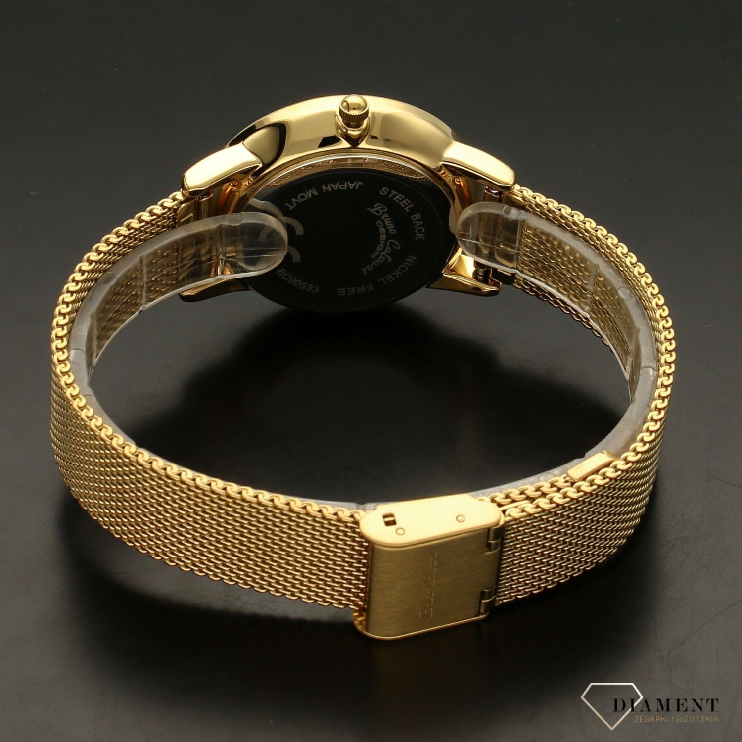 Zegarek damski BRUNO CALVANI BC90533 złoty brokatowa tarcza. Zegarek damski z piękną, modową tarczą zegarka. Tarc w jasnym kolorze. Bransoleta meshowa oraz koperta zegarka w kolorze złota. Zegarek damski w złot (.jpg